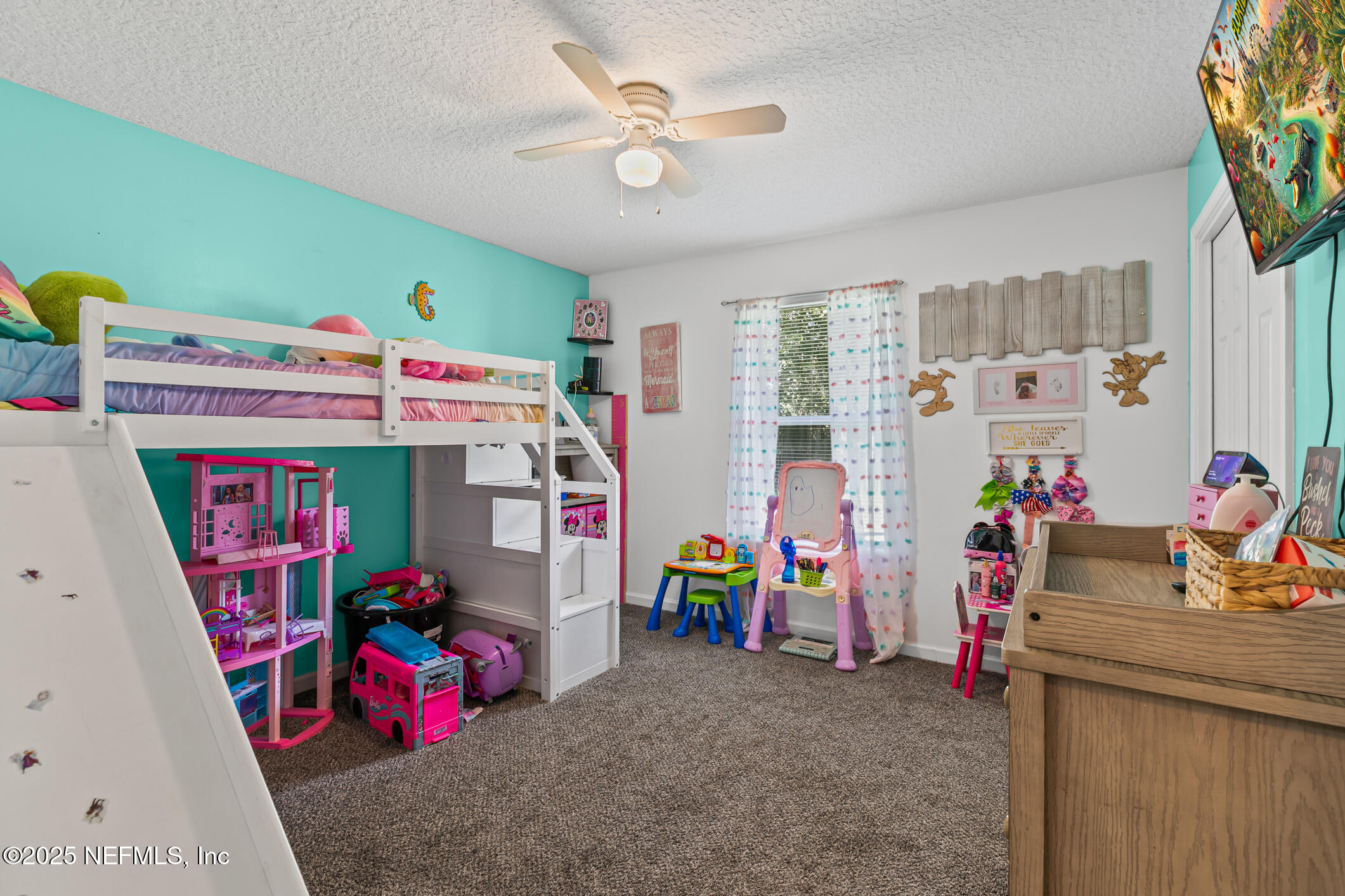 1725 South Summer Ridge Court St. Augustine, FL 32092 - Photo 25 of 46 a children room with toys and a chandelier