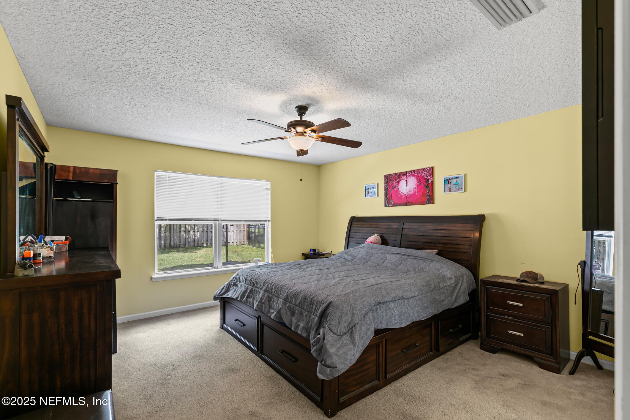 1725 South Summer Ridge Court St. Augustine, FL 32092 - Photo 29 of 46 a bedroom with a bed and a window