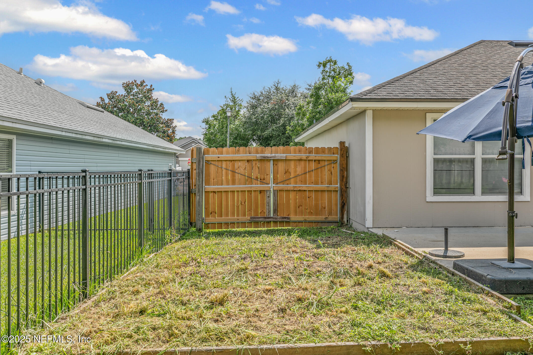 1725 South Summer Ridge Court St. Augustine, FL 32092 - Photo 36 of 46 a view of a backyard