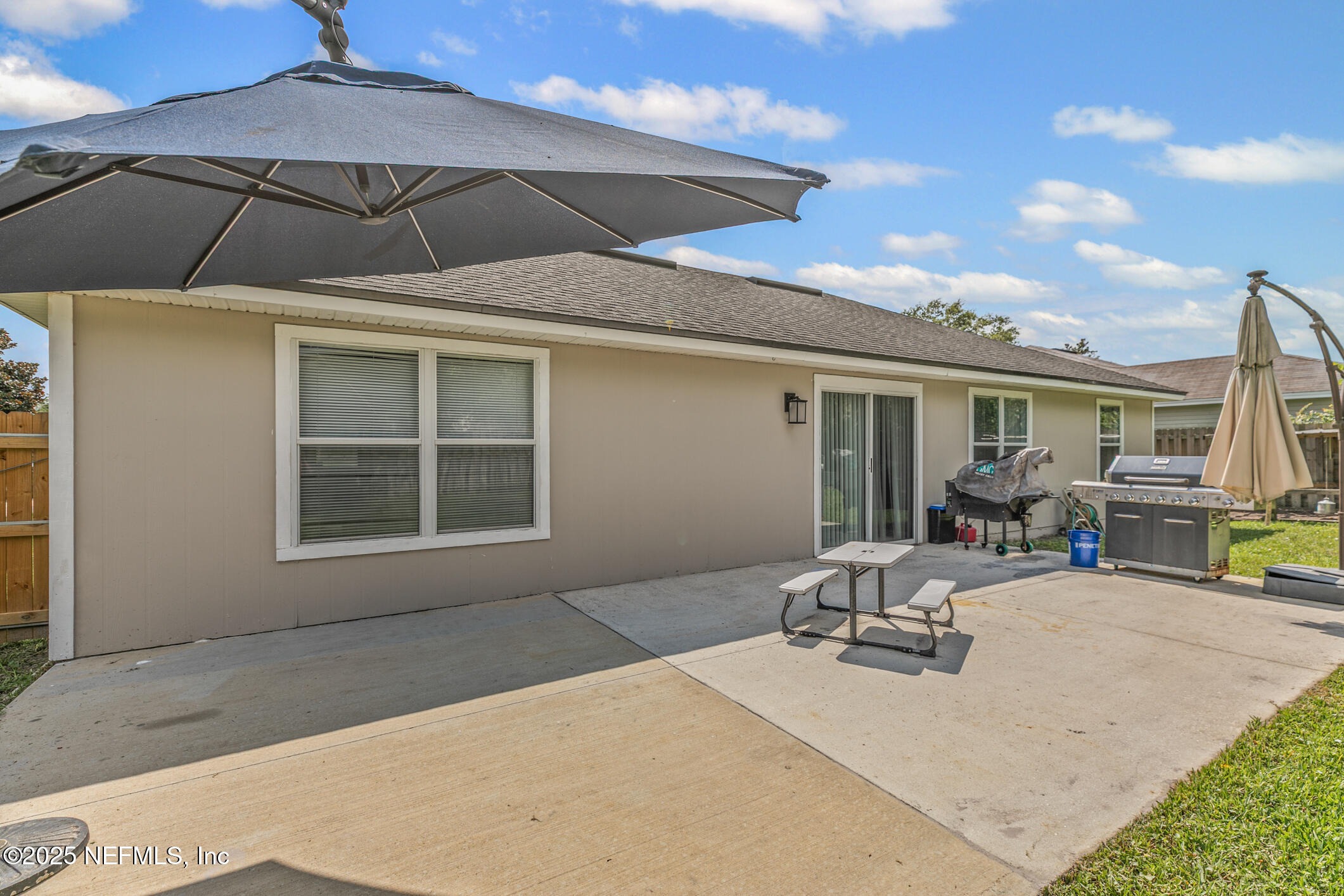 1725 South Summer Ridge Court St. Augustine, FL 32092 - Photo 38 of 46 a house with swimming pool in front of it