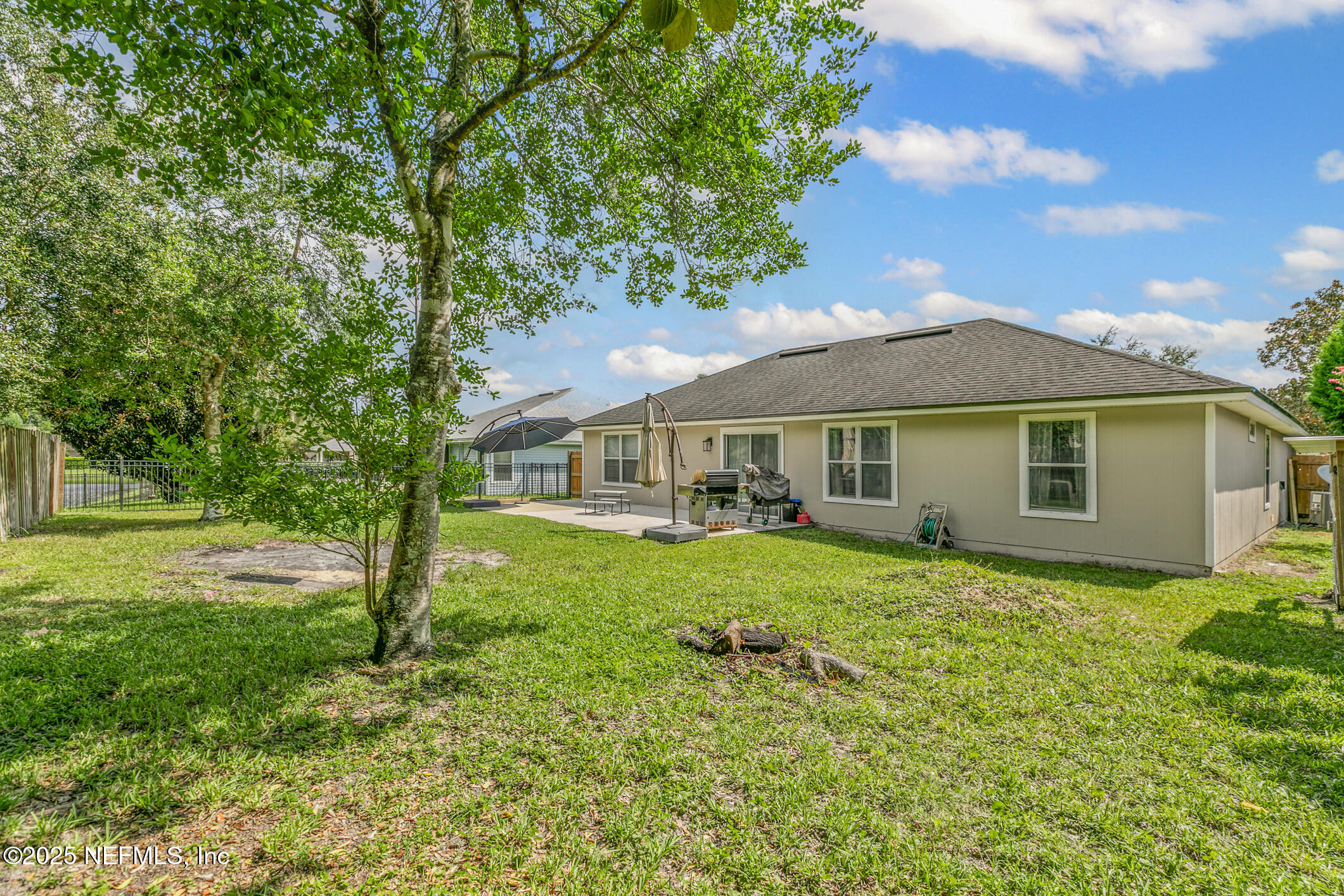1725 South Summer Ridge Court St. Augustine, FL 32092 - Photo 42 of 46 a front view of a house with a garden