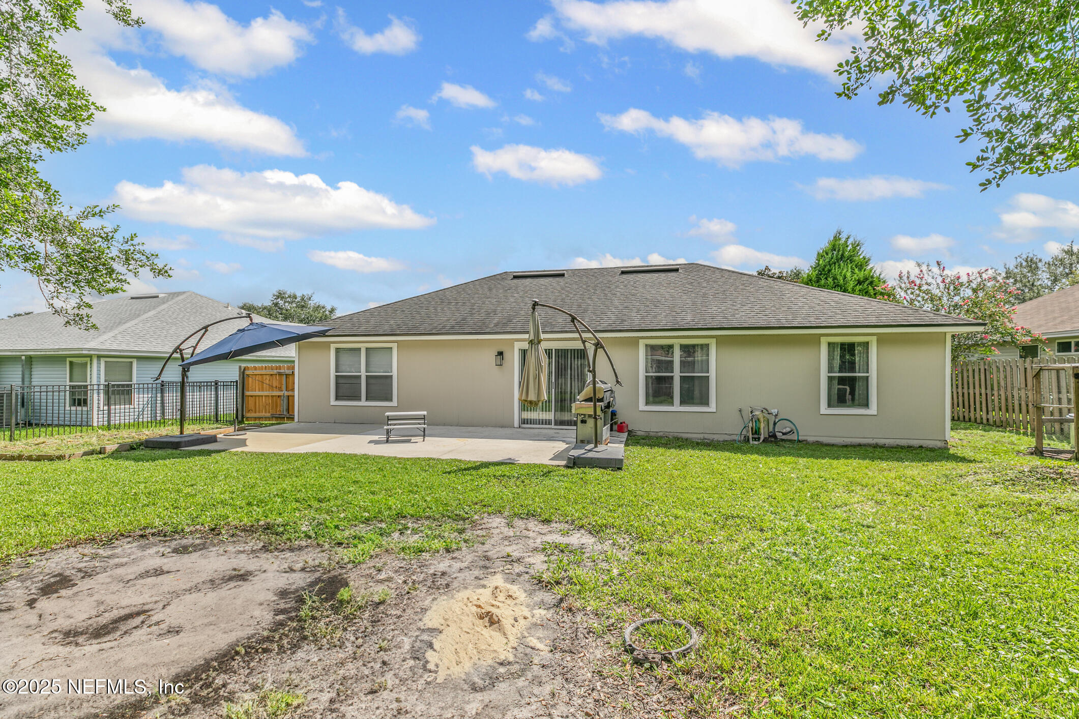 1725 South Summer Ridge Court St. Augustine, FL 32092 - Photo 44 of 46 front view of a house with a garden