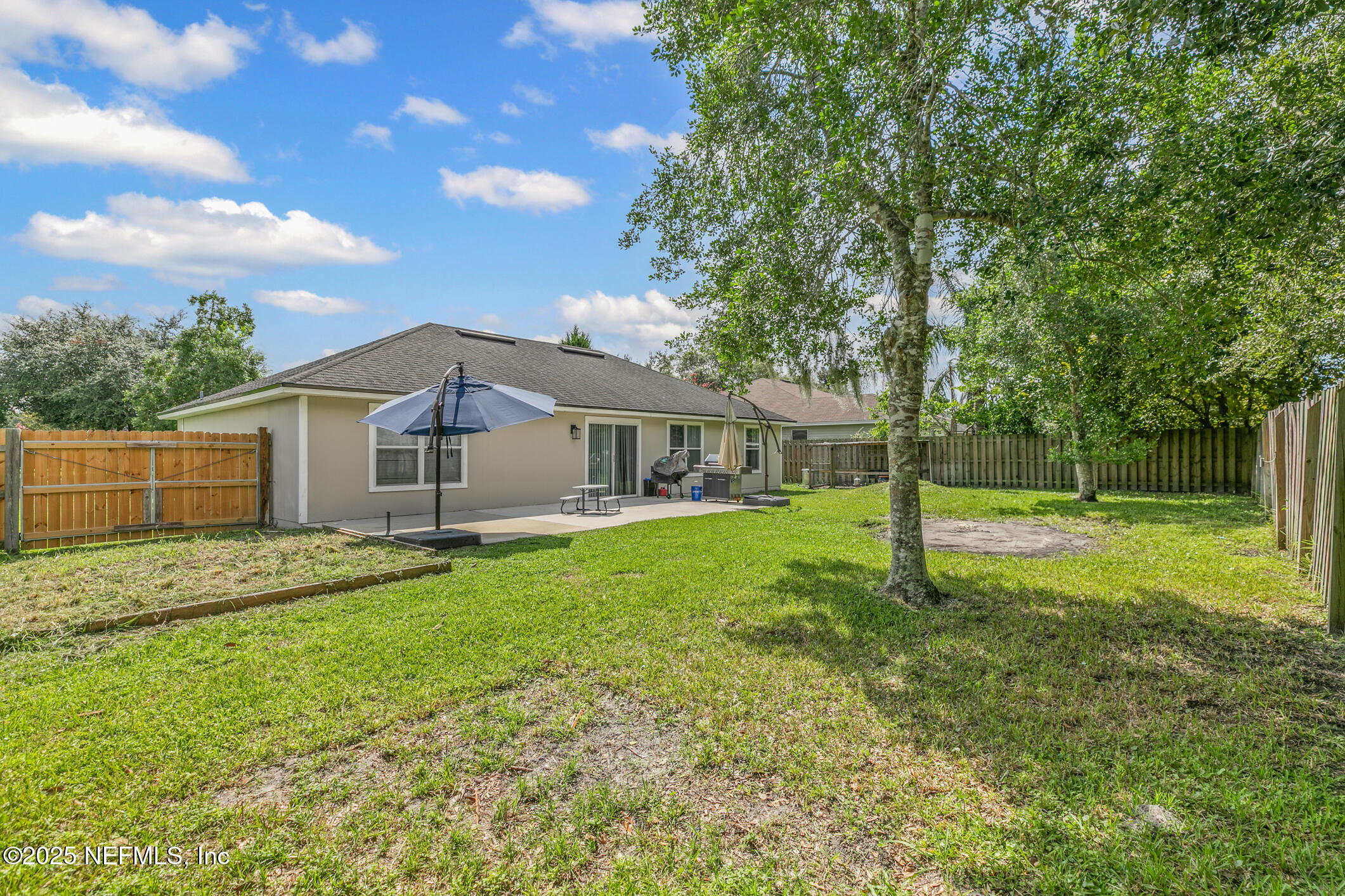 1725 South Summer Ridge Court St. Augustine, FL 32092 - Photo 46 of 46 a view of a house with a backyard