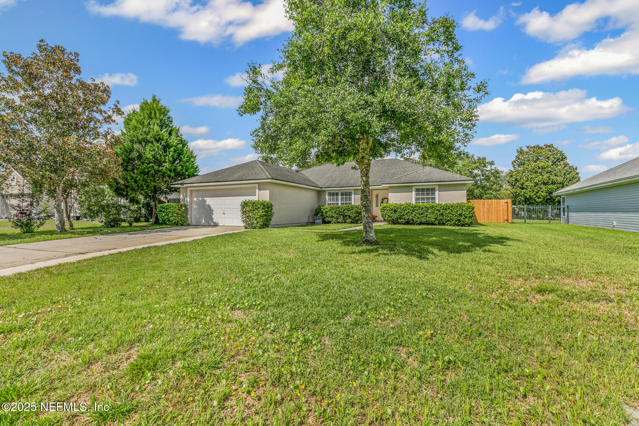 1725 South Summer Ridge Court St. Augustine, FL 32092 - Photo 5 of 46 a front view of a house with a yard