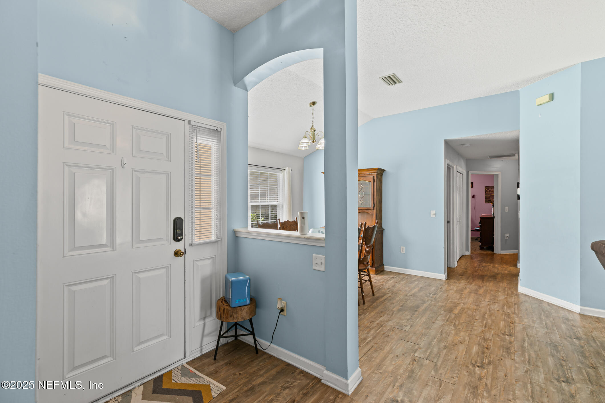 1725 South Summer Ridge Court St. Augustine, FL 32092 - Photo 9 of 46 a view of a livingroom with furniture and front door