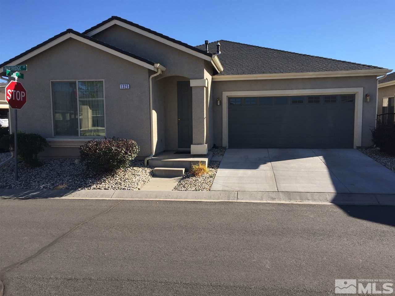 1325 Partridge Drive Carson City, NV 89701 - Photo 1 of 3 a front view of a house