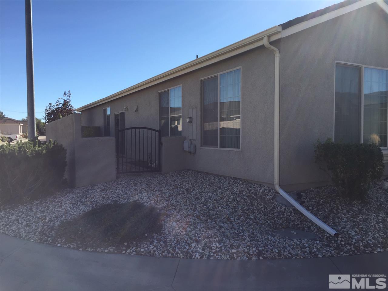 1325 Partridge Drive Carson City, NV 89701 - Photo 3 of 3 a backyard of a house