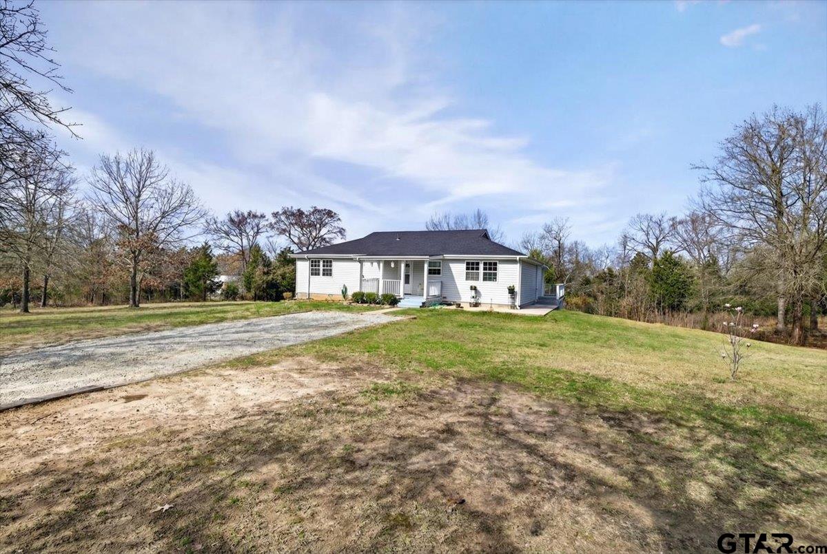 2375 County Road 3282 Buffalo, TX 75831 - Photo 2 of 48 a front view of house with yard and trees in the background