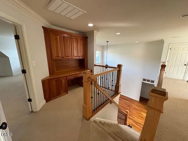 a view of empty room with a ceiling fan