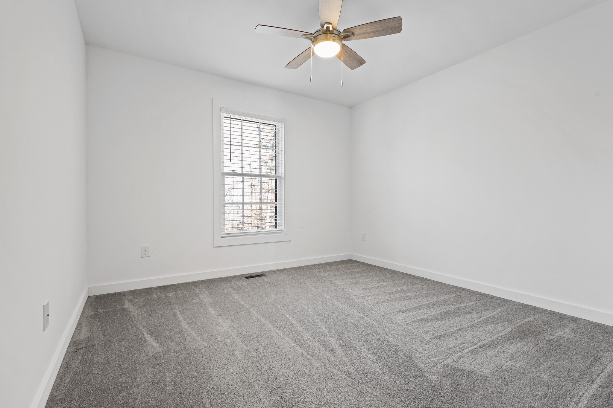 1517 Ridgeview Run Lynchburg, TN 37352 - Photo 12 of 37 wooden floor in an empty room with a window
