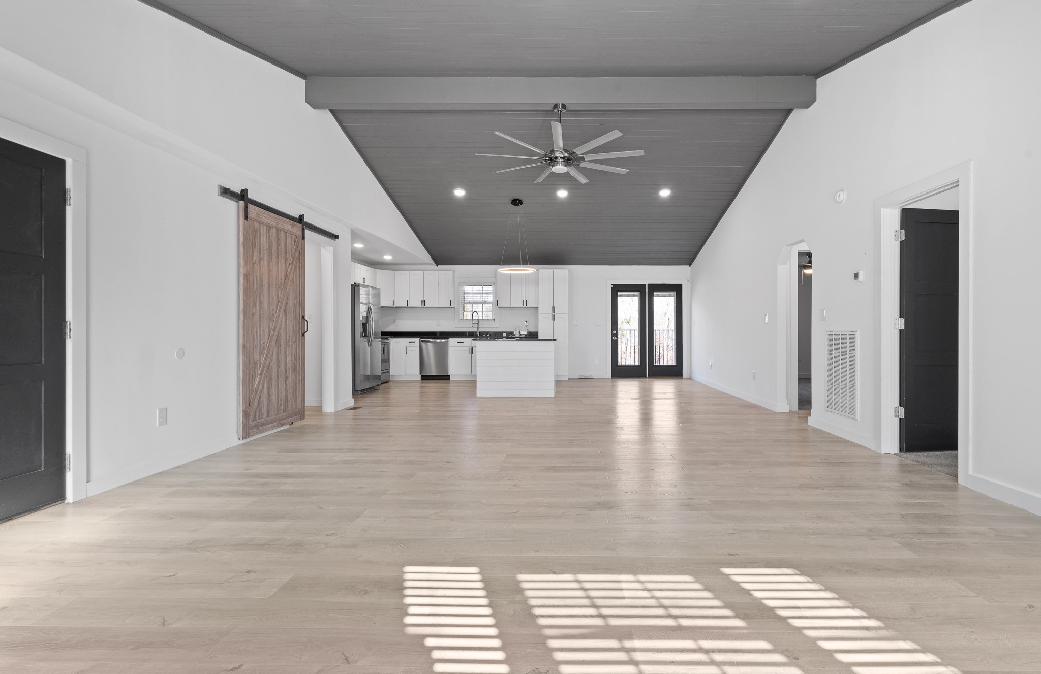 1517 Ridgeview Run Lynchburg, TN 37352 - Photo 19 of 37 a view of empty room with wooden floor and windows