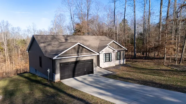 a house with trees in the background