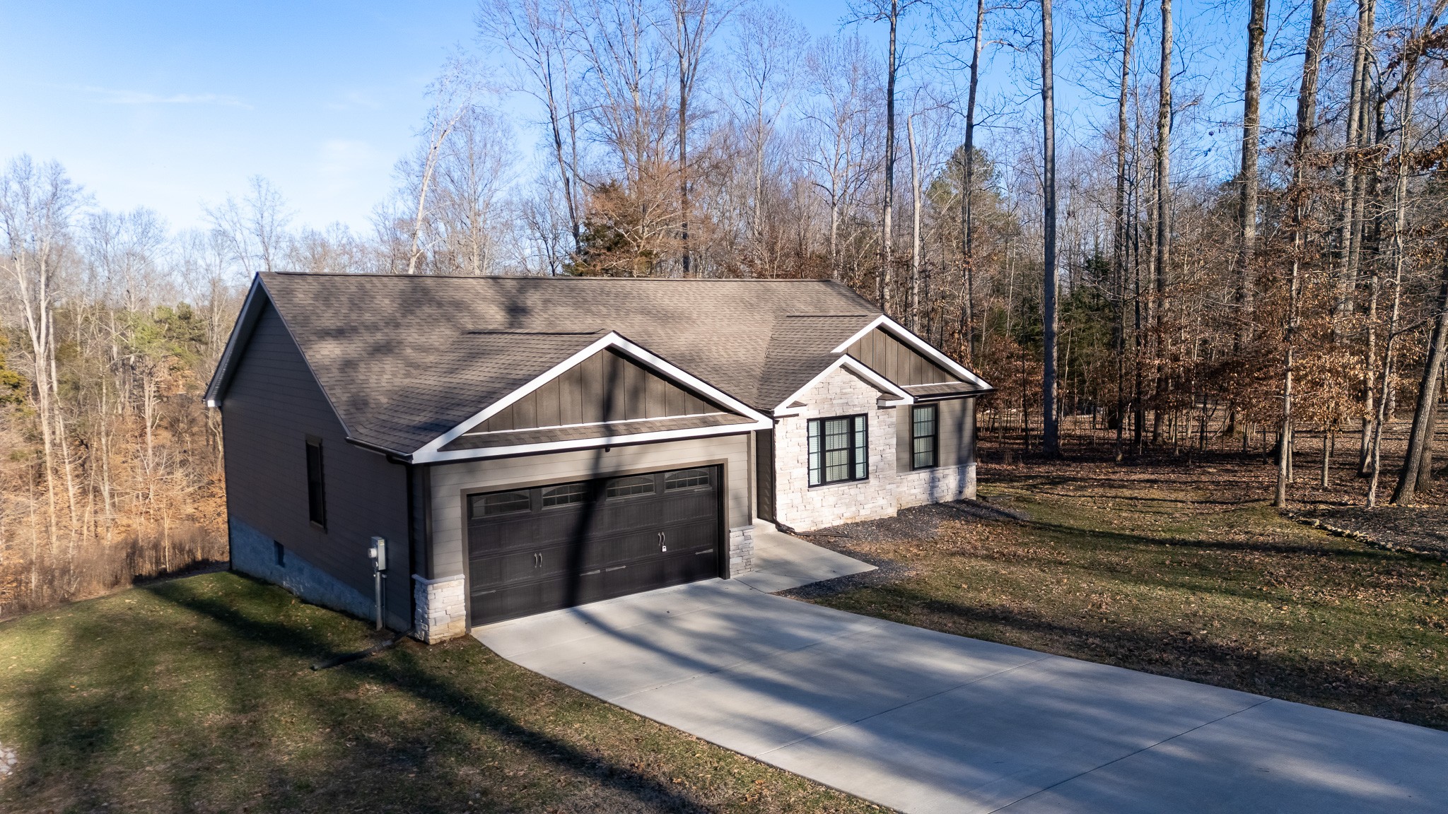 1517 Ridgeview Run Lynchburg, TN 37352 - Photo 36 of 37 a house with trees in the background