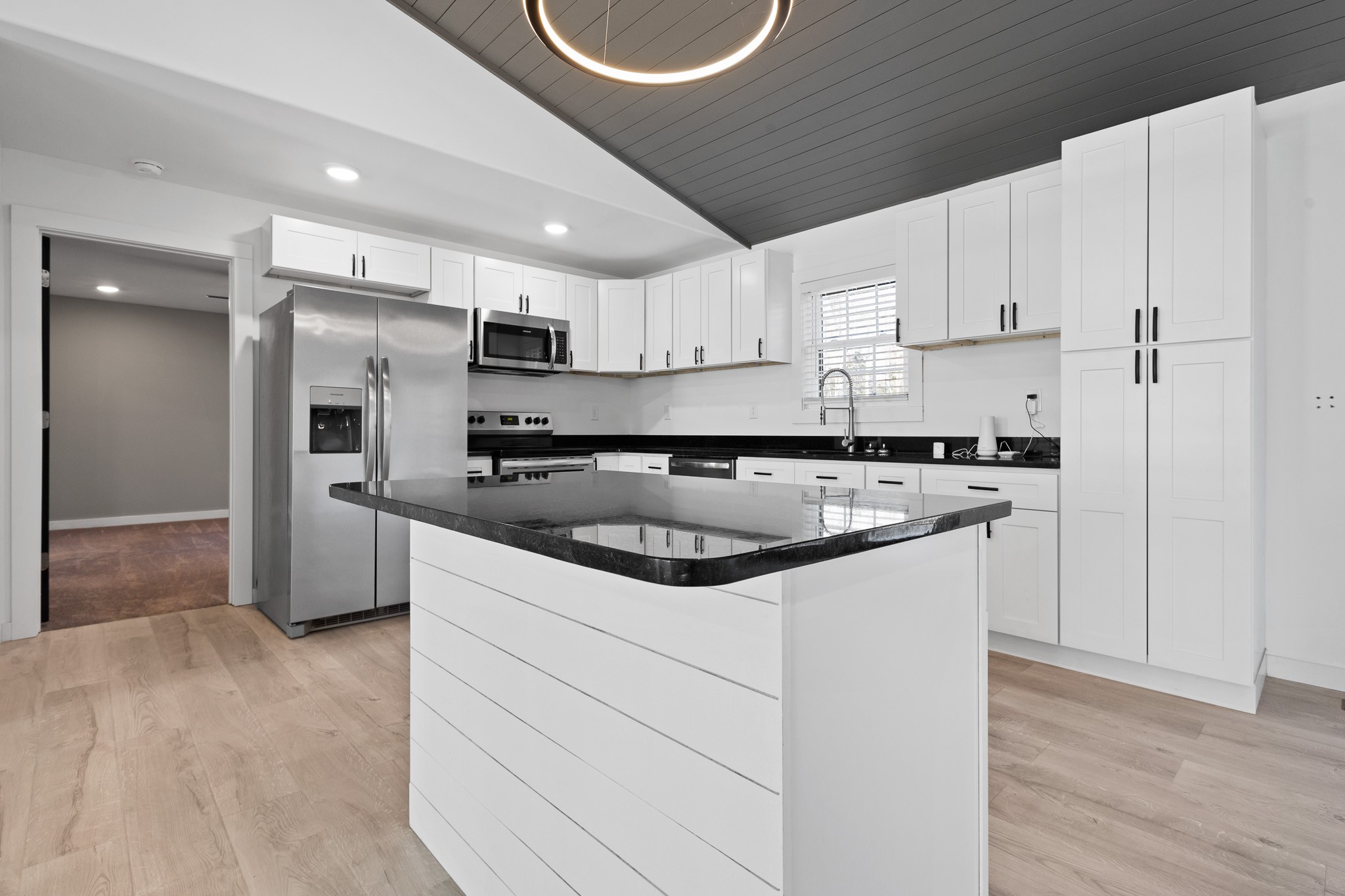 1517 Ridgeview Run Lynchburg, TN 37352 - Photo 5 of 37 a kitchen with kitchen island a sink stainless steel appliances and cabinets