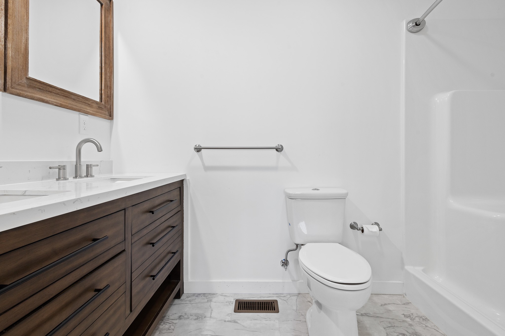 1517 Ridgeview Run Lynchburg, TN 37352 - Photo 9 of 37 a bathroom with a toilet a sink and mirror