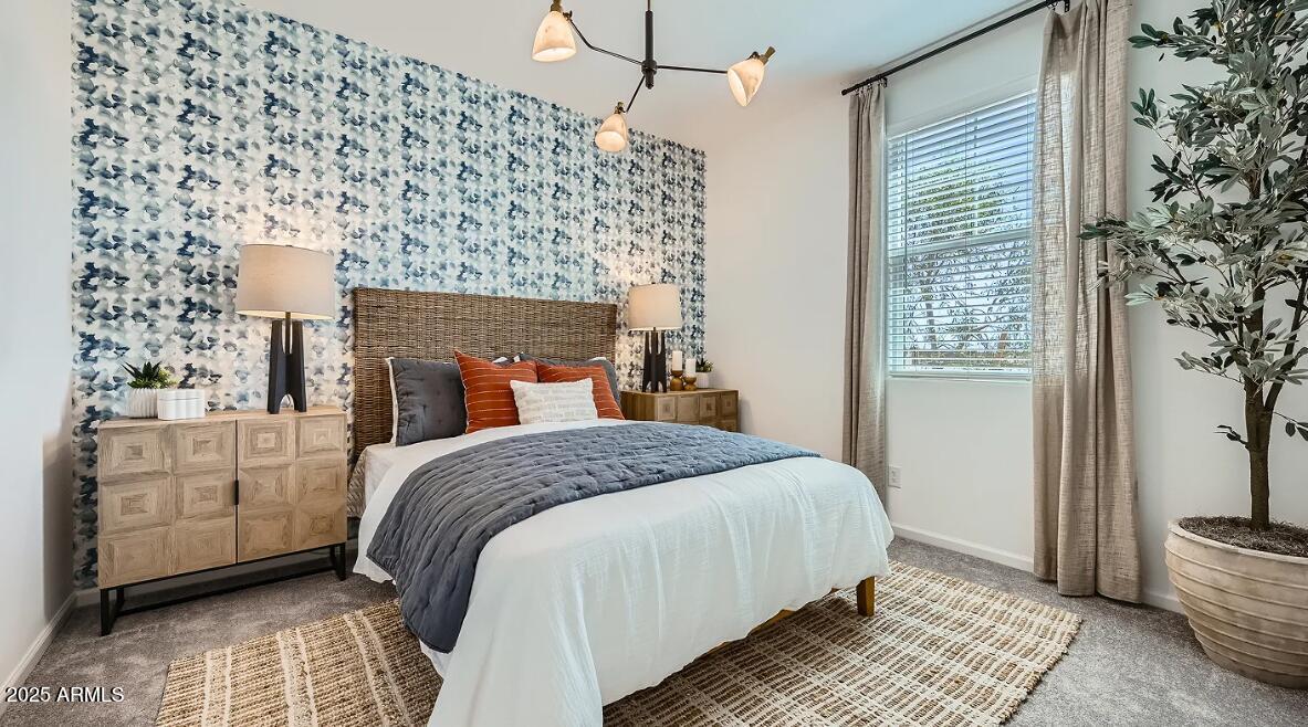 9517 West Cheery Lynn Road Phoenix, AZ 85392 - Photo 20 of 27 a bedroom with a bed and a window