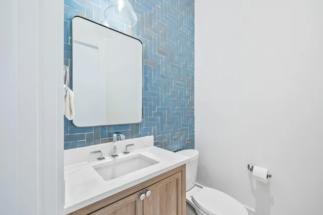 a view of a hallway with washer and dryer