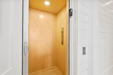 a bathroom with a shower and a toilet