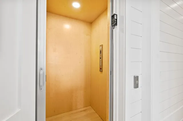 a bathroom with a shower and a toilet