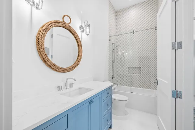 a view of a dining room with furniture wooden floor and chandelier