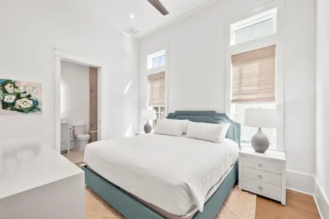 a view of a dining room with furniture wooden floor and chandelier