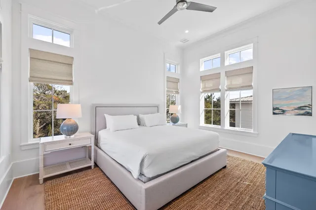 a bathroom with a sink a mirror and a window