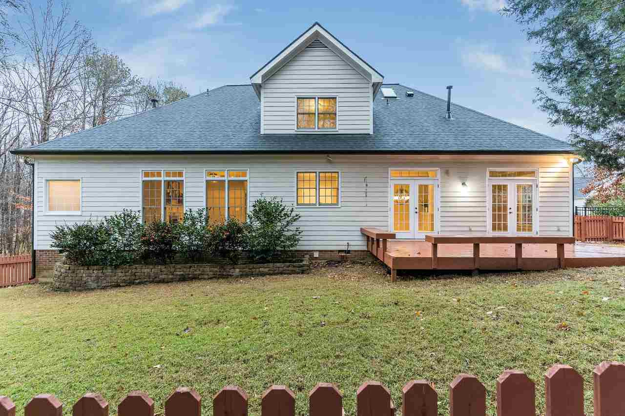 3712 Evander Way Raleigh, NC 27613 - Photo 12 of 13 There are a few nice retaining walls around the yard and the landscaping is gorgeous! Nothing to do except move in! Exterior Back