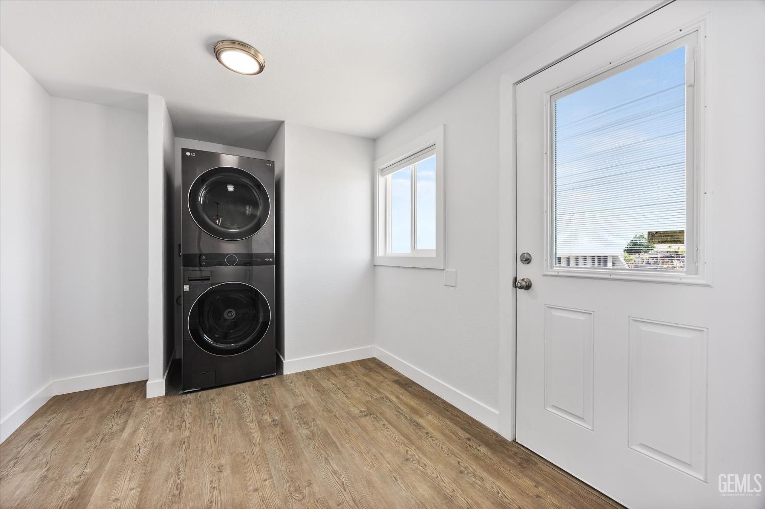 Undisclosed Address Taft, CA 93268 - Photo 34 of 40 a view of a kitchen with washer and dryer