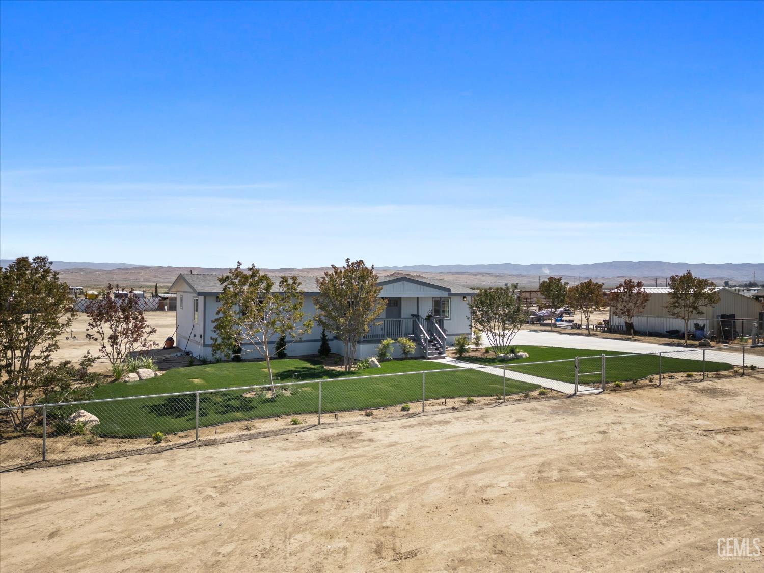 Undisclosed Address Taft, CA 93268 - Photo 5 of 40 a view of a town with mountains in the background