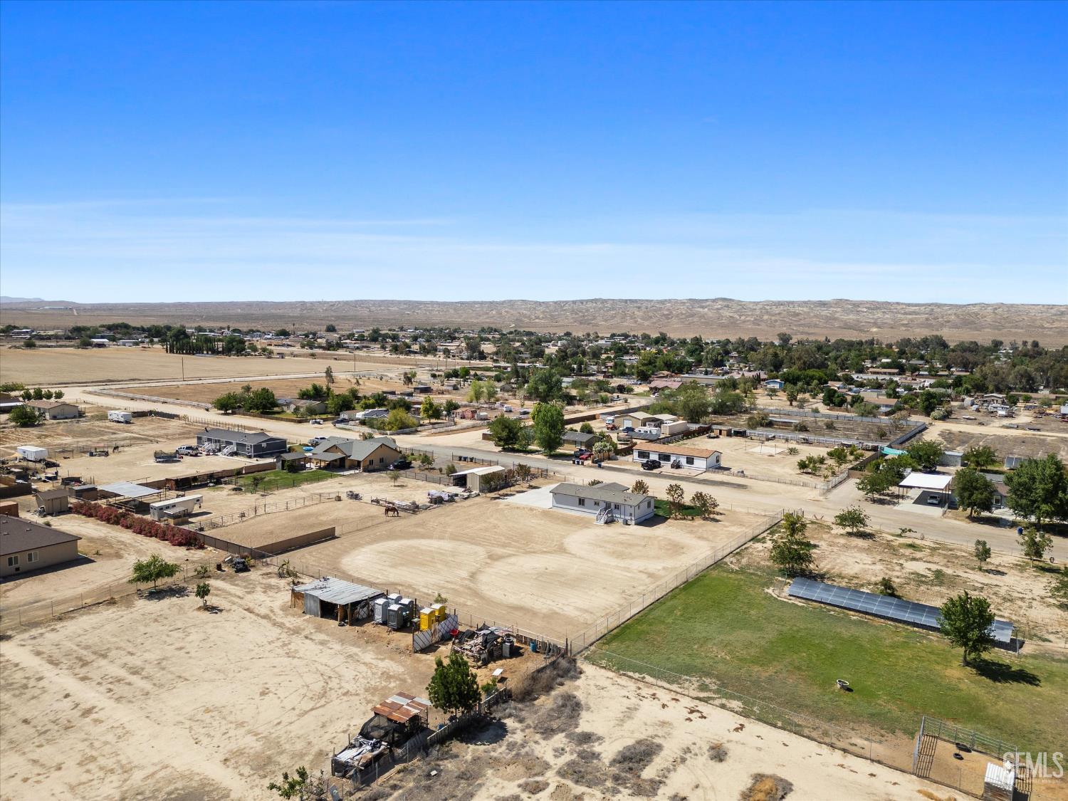 Undisclosed Address Taft, CA 93268 - Photo 10 of 40 an aerial view of residential houses with outdoor space