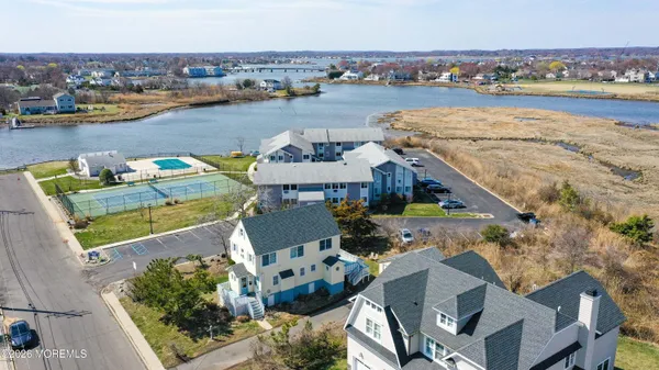 an aerial view of a house with outdoor space