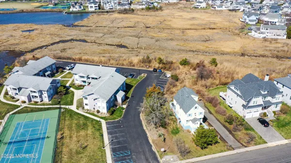 an aerial view of a house with outdoor space