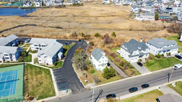 an aerial view of a house with outdoor space