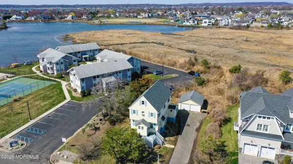 an aerial view of a house with outdoor space