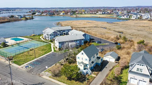 an aerial view of a house with a outdoor space