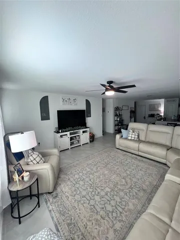 a bedroom with furniture and a couch