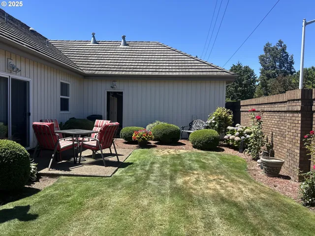 a view of a patio in backyard
