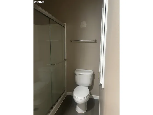 a a bathroom with a toilet