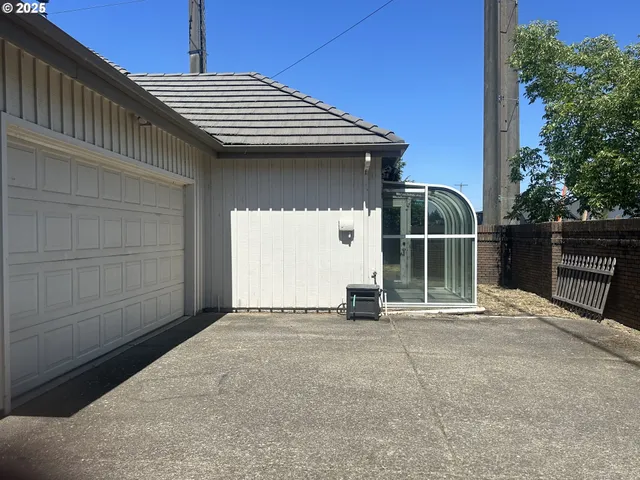 a front view of a house with a garage