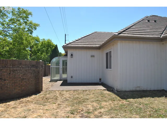 a house view with a backyard