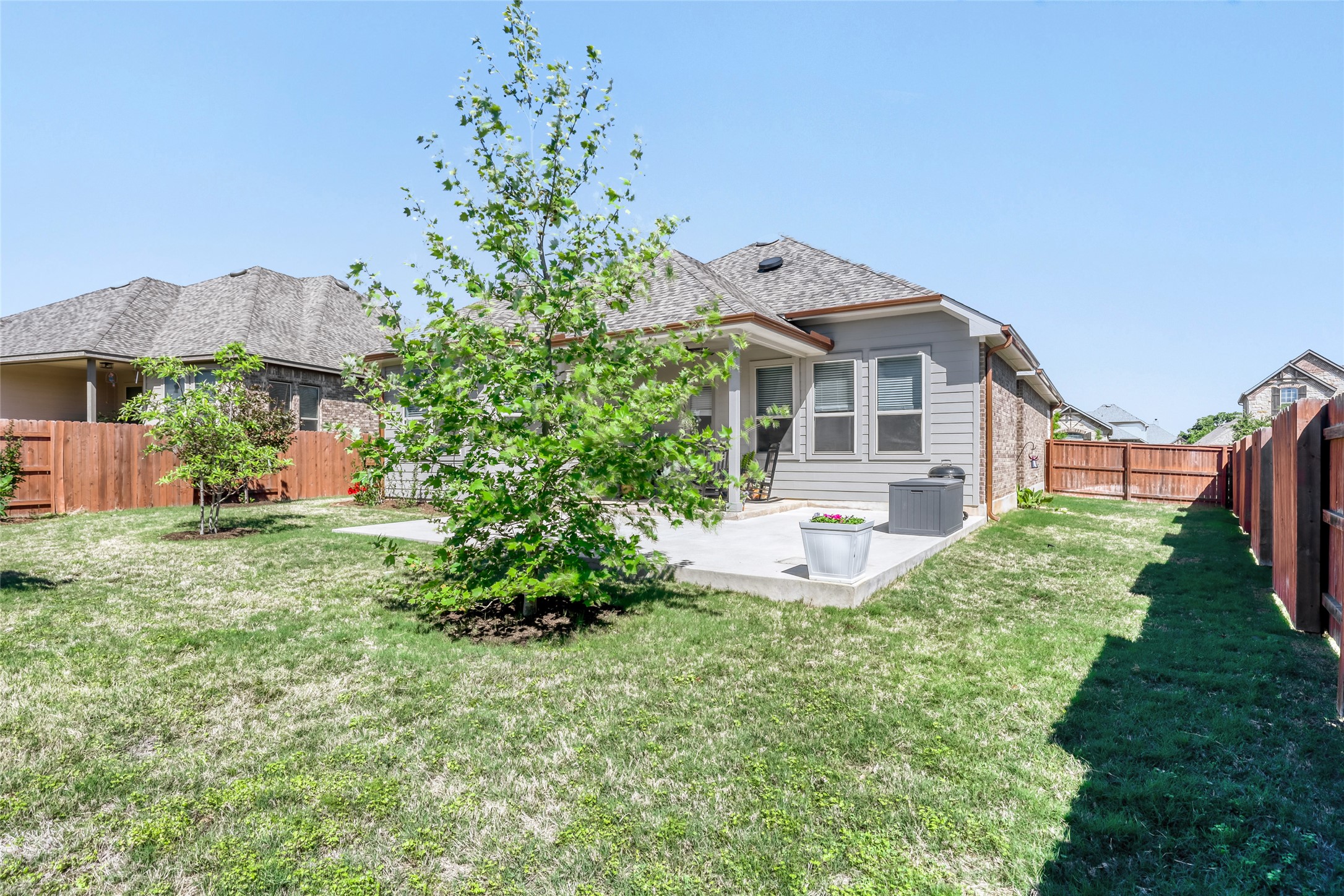 125 Buffalo View Lane Georgetown, TX 78628 - Photo 27 of 28 a front view of a house with a yard