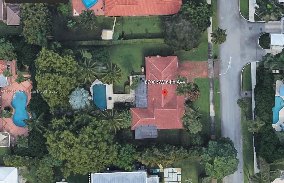 8700 Southwest 64th Avenue Pinecrest, FL 33156 - Photo 11 of 11 an aerial view of a house with outdoor space
