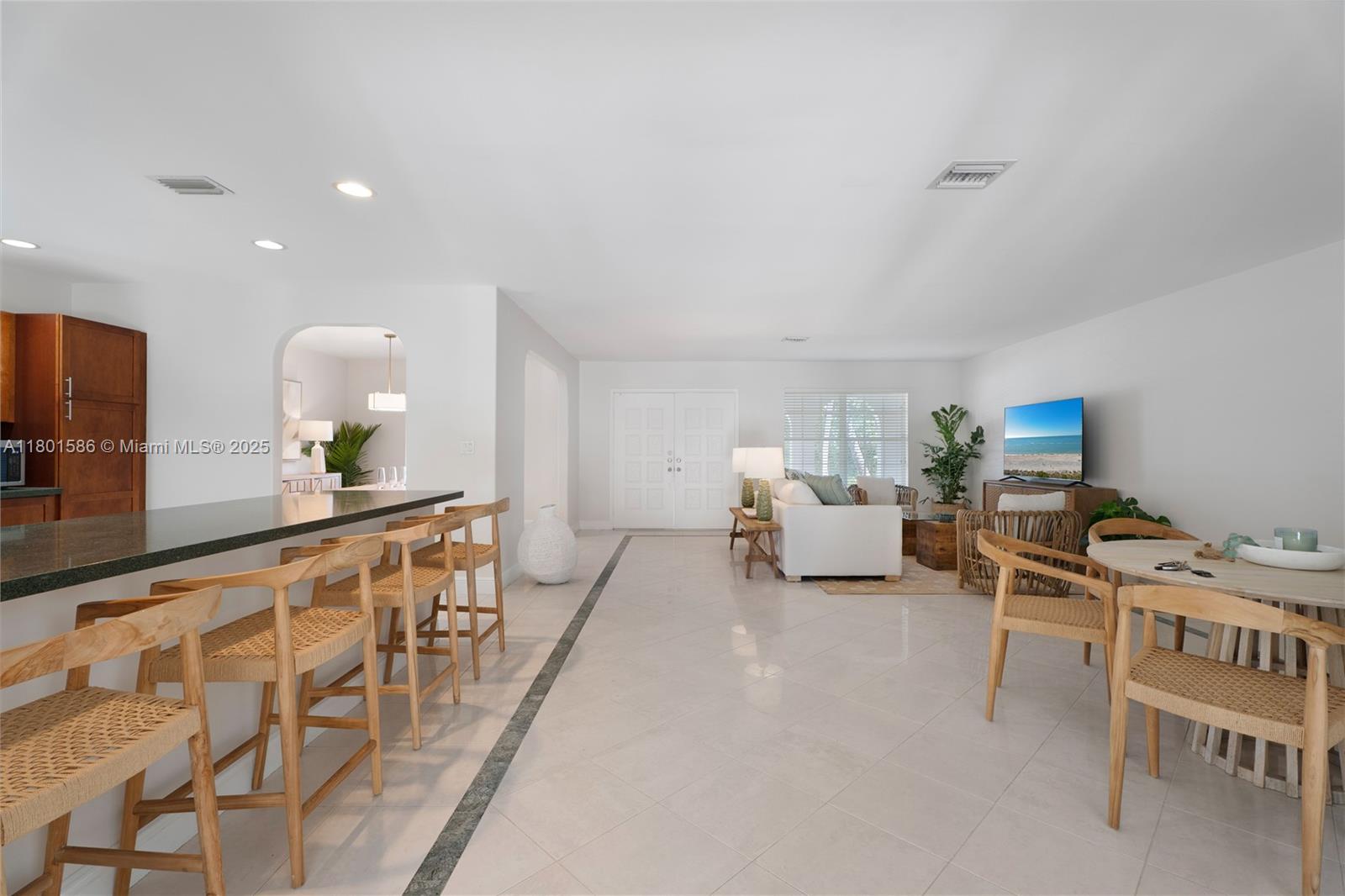 8700 Southwest 64th Avenue Pinecrest, FL 33156 - Photo 5 of 11 a living room with furniture