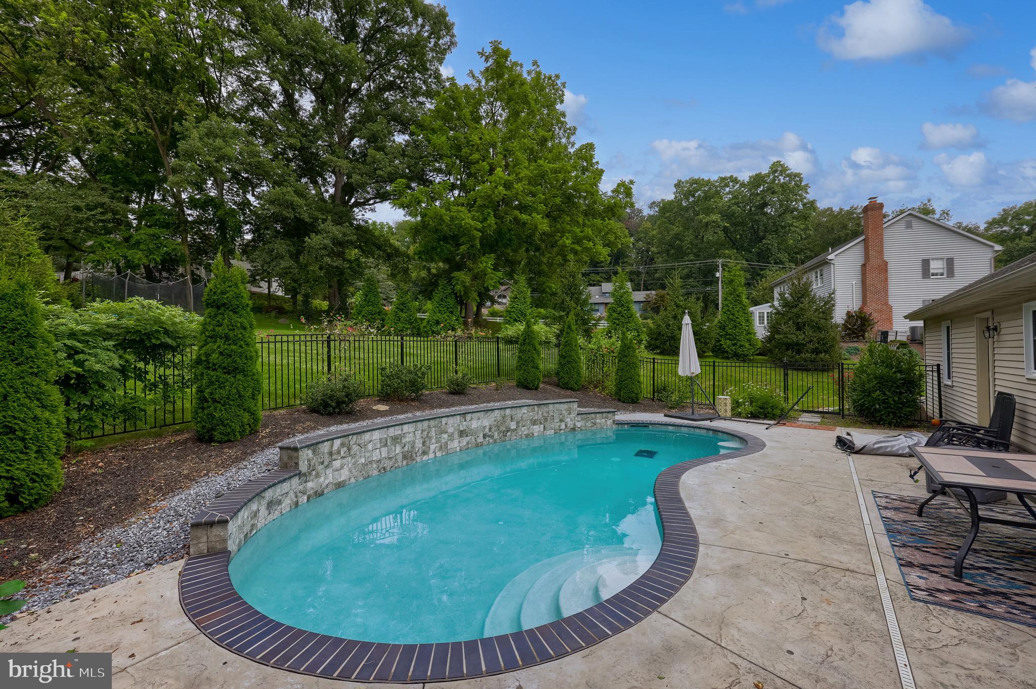 2504 Brookside Drive Lancaster, PA 17601 - Photo 9 of 53 a view of a swimming pool with a patio
