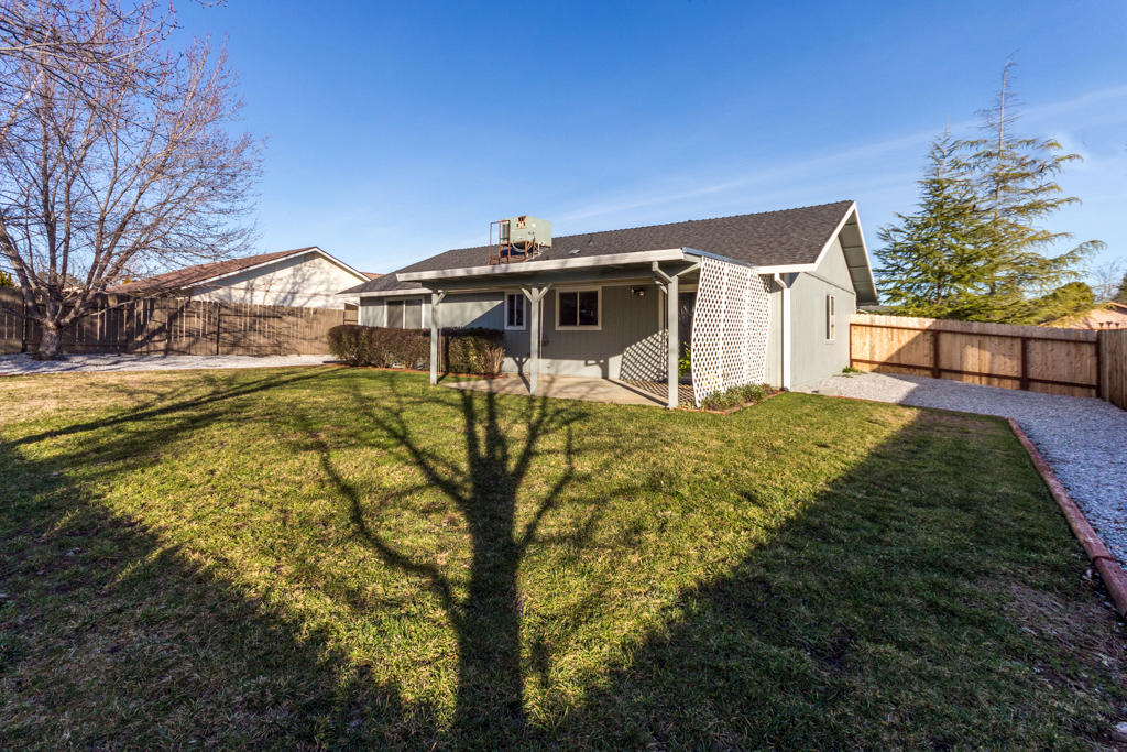 11380 Puffin Way Redding, CA 96003 - Photo 20 of 27 a view of a house with a yard
