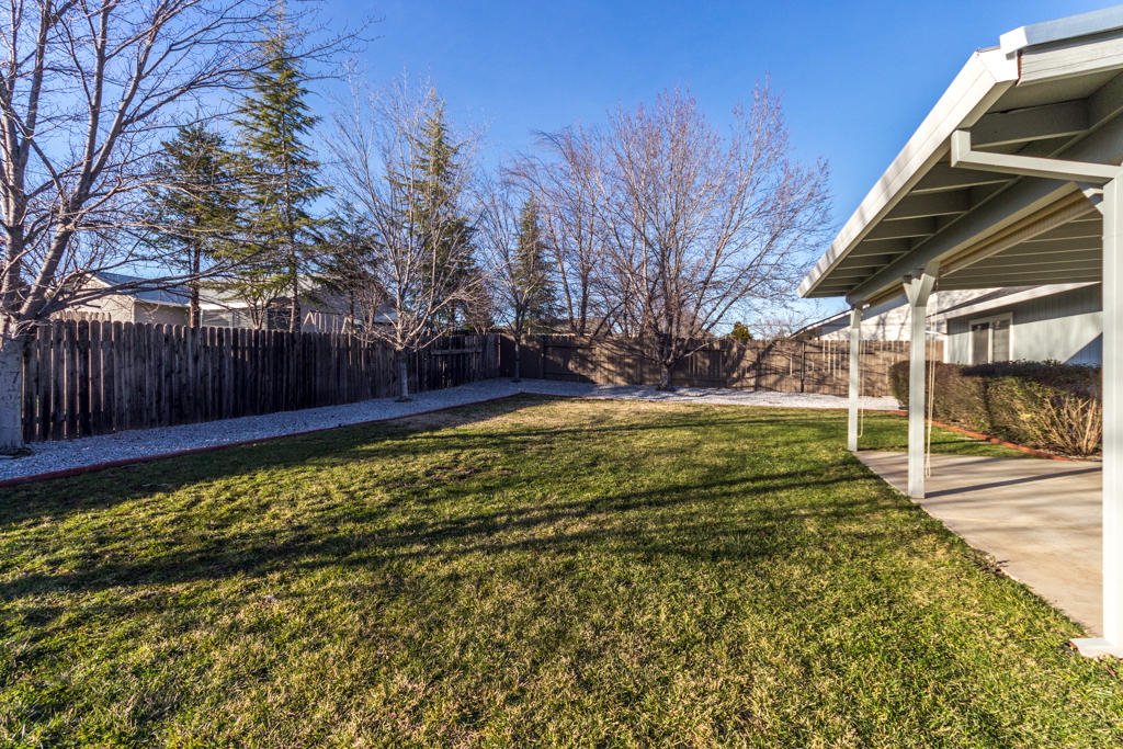 11380 Puffin Way Redding, CA 96003 - Photo 21 of 27 a view of a garden with a house