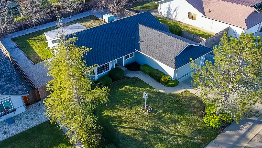 11380 Puffin Way Redding, CA 96003 - Photo 25 of 27 an aerial view of a house with swimming pool and garden