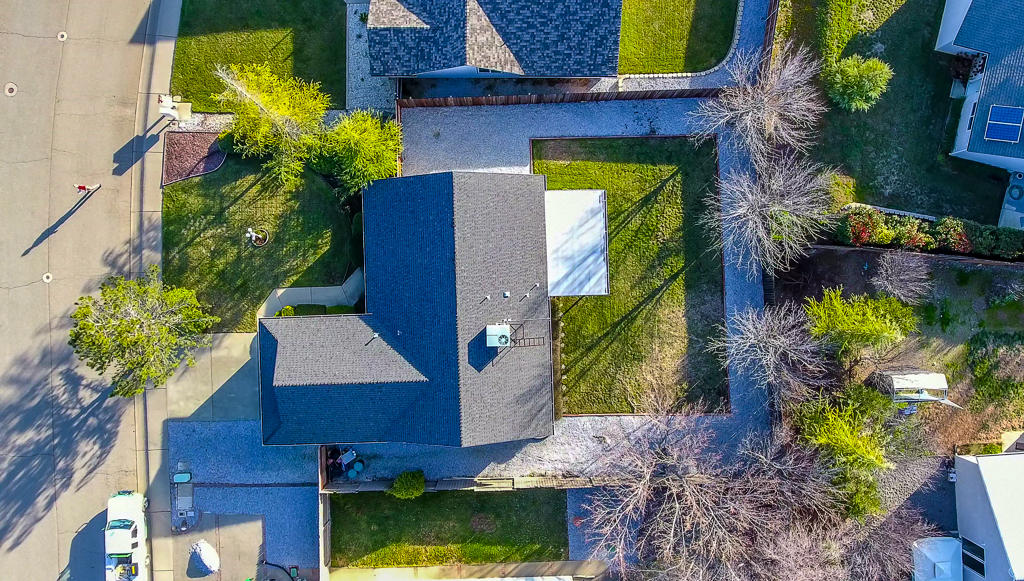 11380 Puffin Way Redding, CA 96003 - Photo 27 of 27 front view of a house with a yard