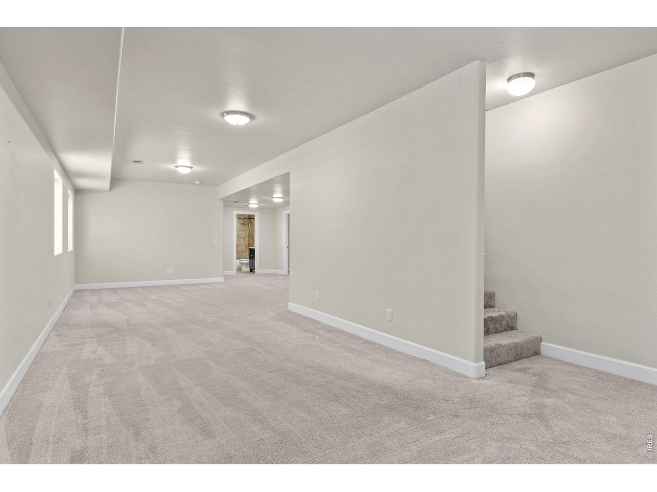 2002 Trail Ridge Drive Severance, CO 80615 - Photo 27 of 50 Another standout feature of the home is the fully finished basement featuring a large rec room that gives you flexibility for entertaining or relaxing.