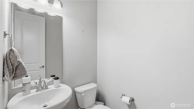 a bathroom with a sink and a toilet